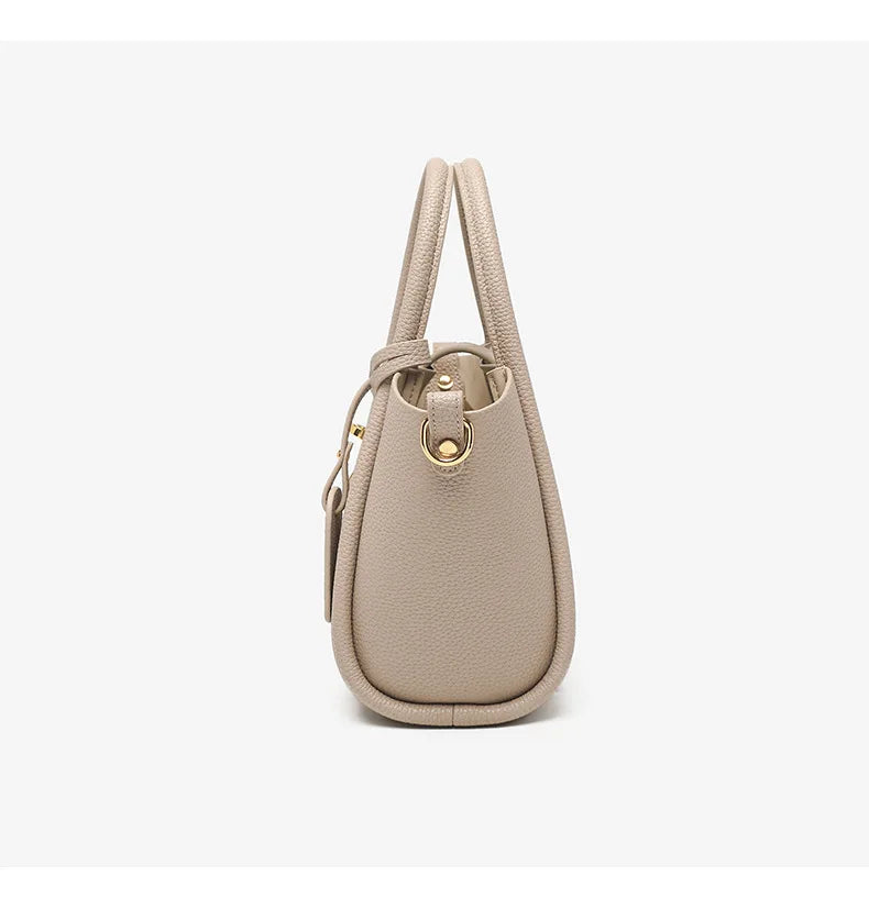 Alina | Bolso de mano de piel con cierre giratorio