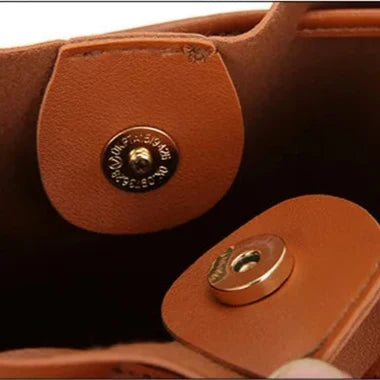 Brenda | Bolso saco con cordón y borlas