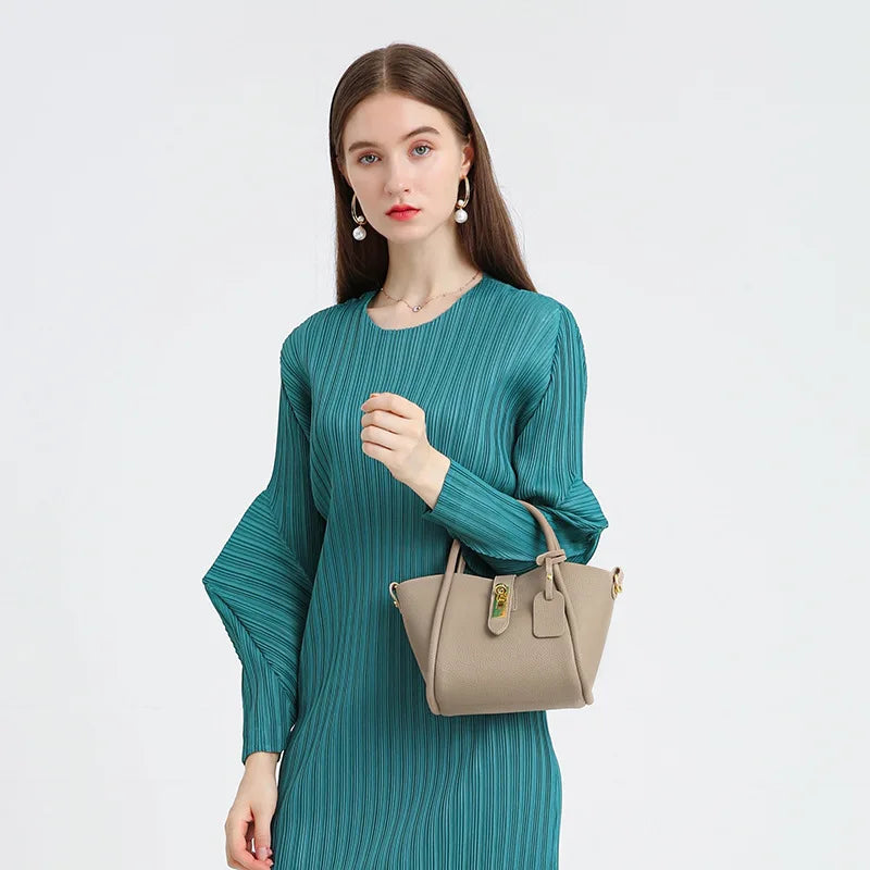 Alina | Bolso de mano de piel con cierre giratorio