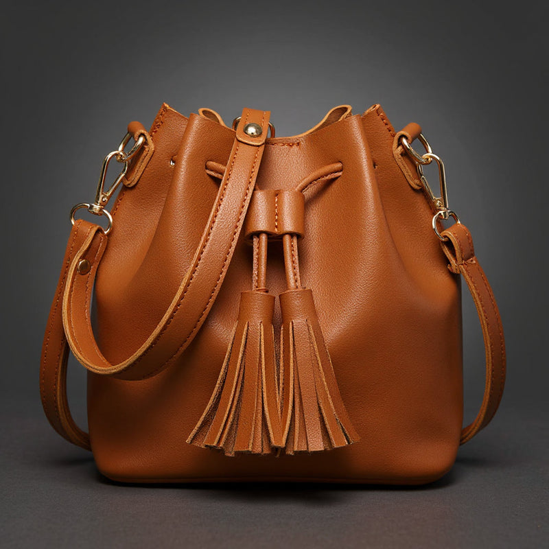 Brenda | Bolso saco con cordón y borlas